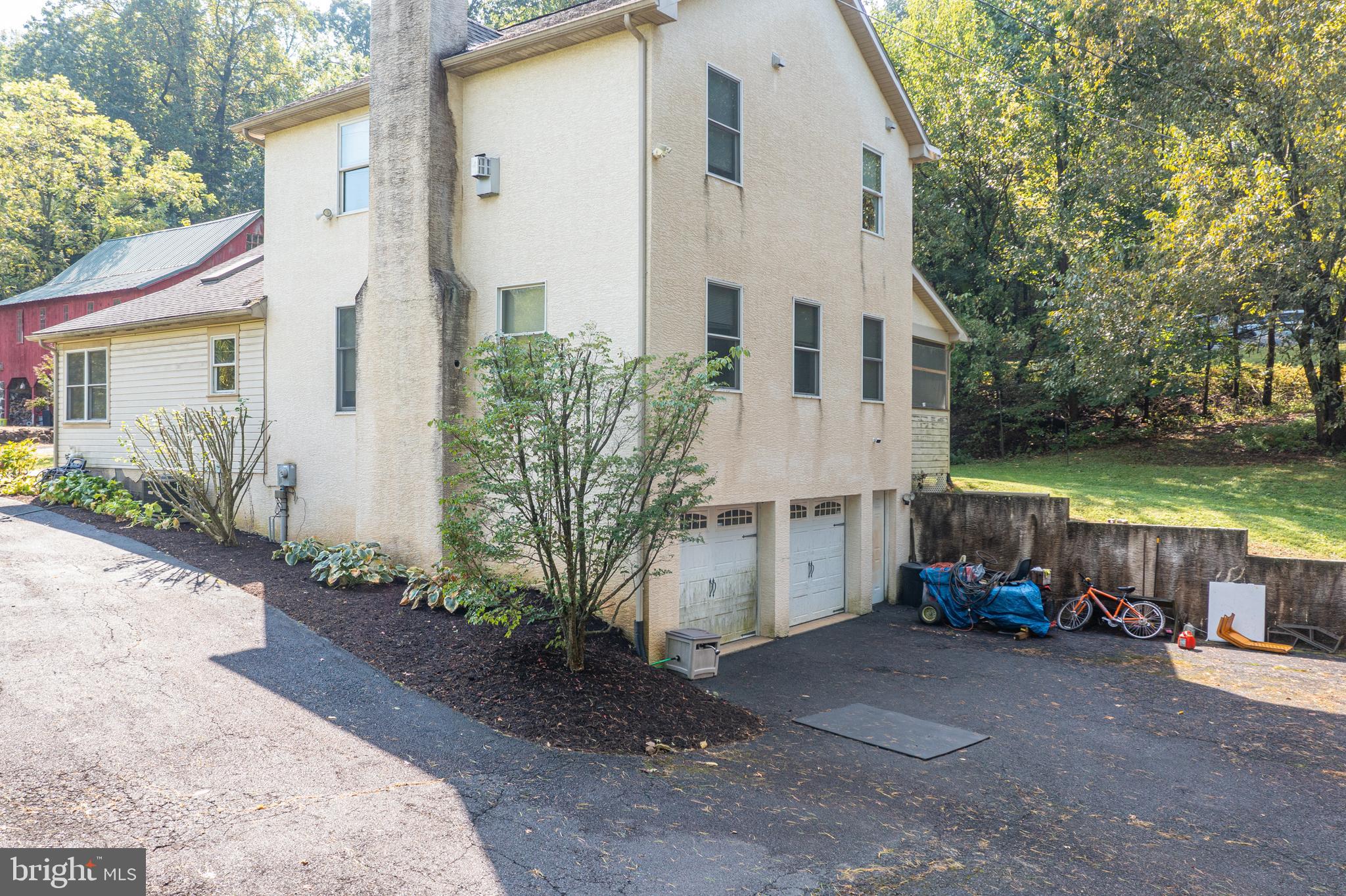 700 Fabers Road Reading, PA 19606 - Photo 23 of 33 a view of a house with backyard and sitting area