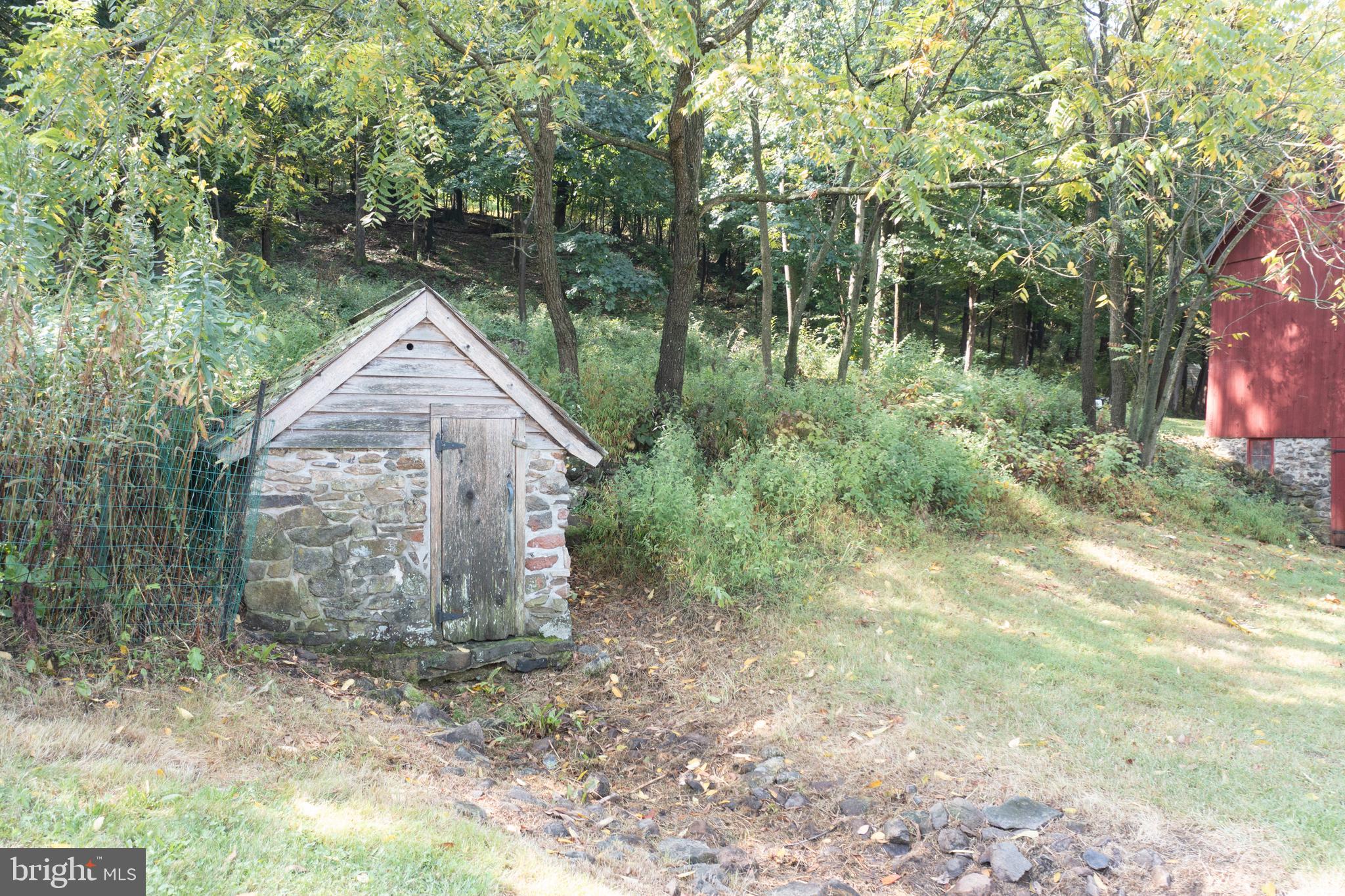 700 Fabers Road Reading, PA 19606 - Photo 25 of 33 a view of a wooden house with a yard
