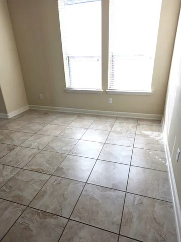 an empty room with a window