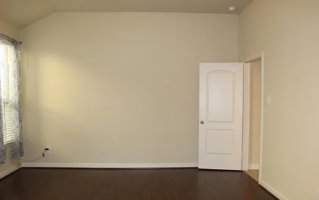 an empty room with a door