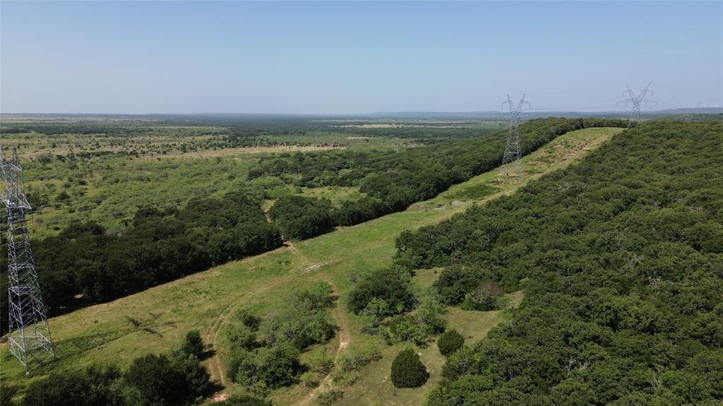 Tbd Nash Road Jacksboro, TX 76458 - Photo 18 of 28 Expansive natural landscape featuring varied topography with dense tree coverage and open grassy areas