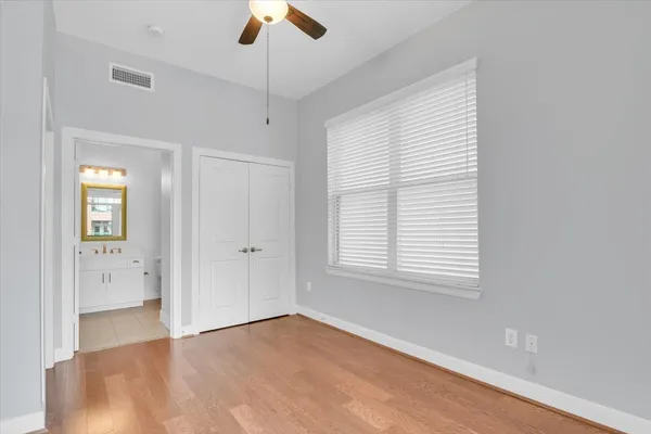 a view of a house with swimming pool and sitting area