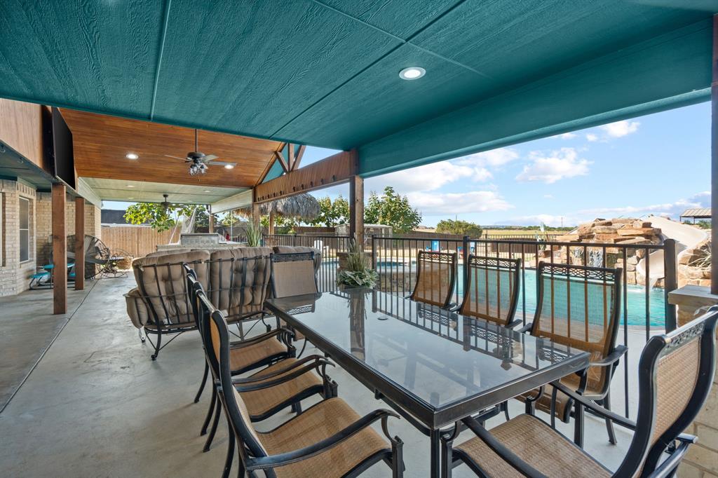4320 Farm To Market 920 Weatherford, TX 76088 - Photo 34 of 39 a view of a patio with a table and chairs