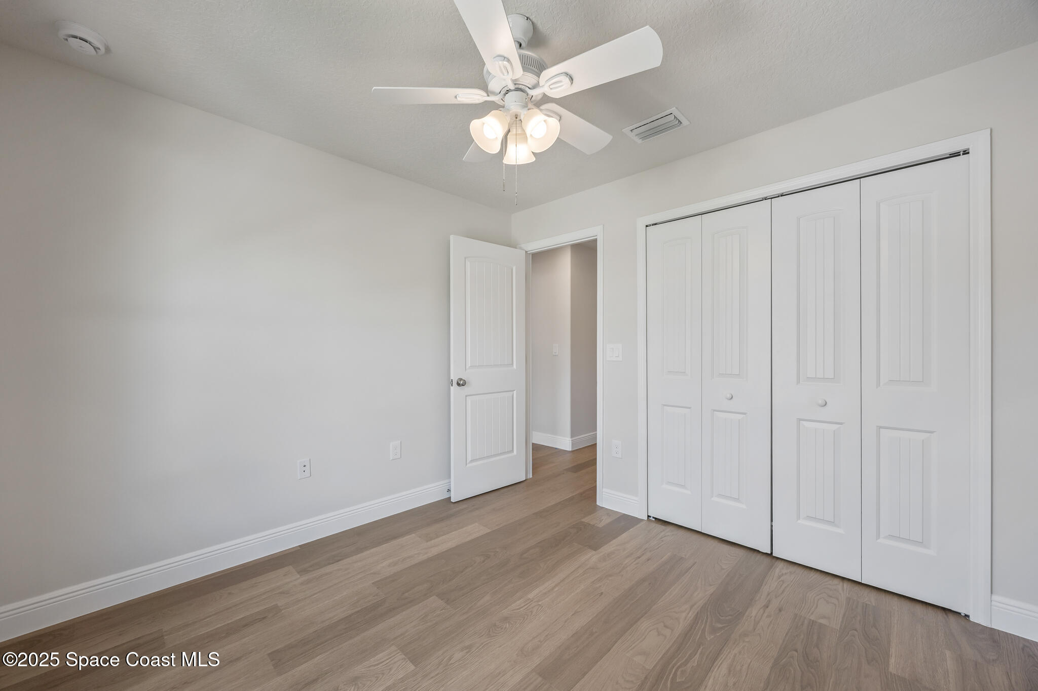178 Hidden Wds Place Melbourne, FL 32901 - Photo 20 of 24 wooden floor in an empty room
