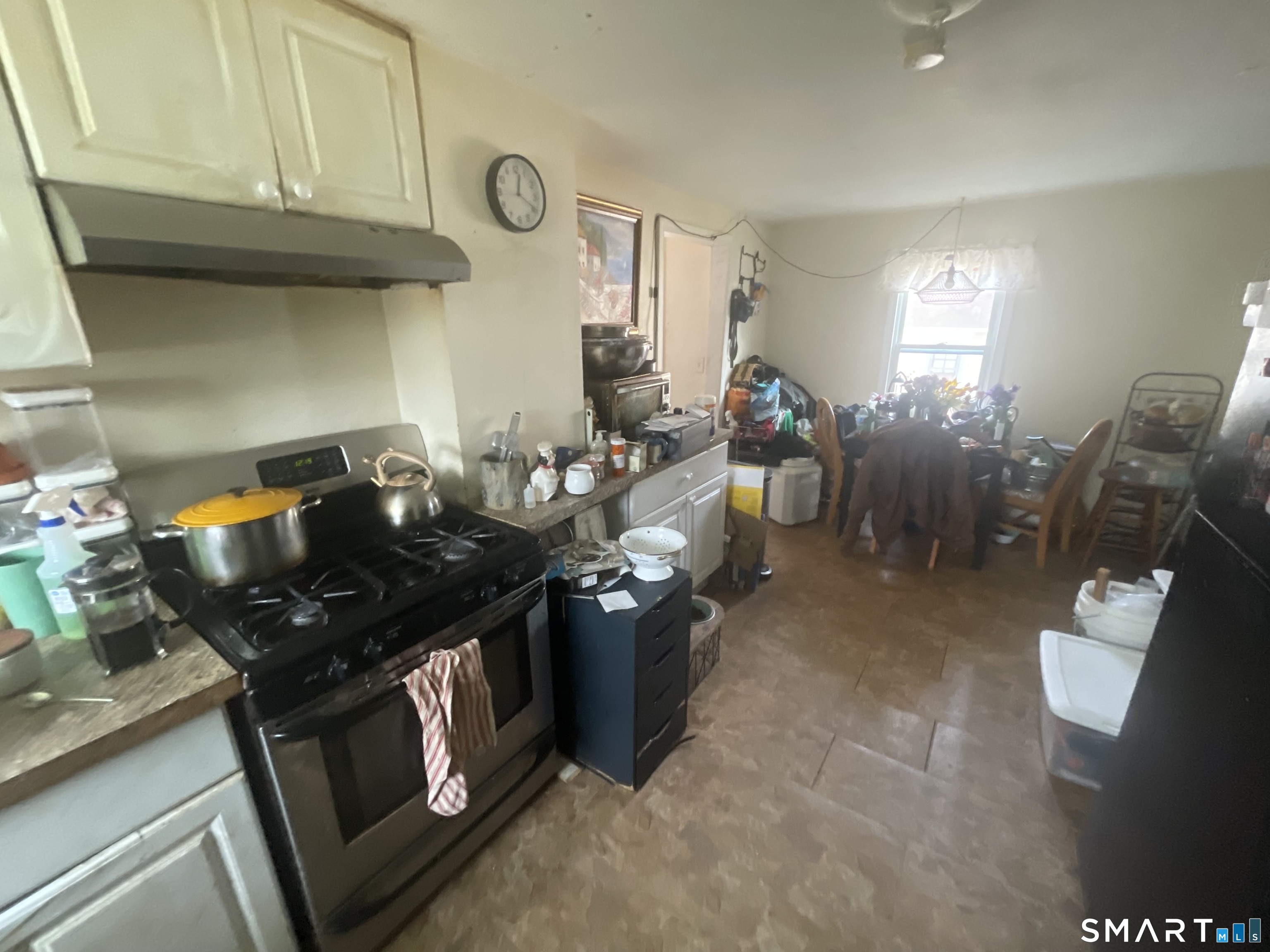 40 Grove Street Ansonia, CT 06401 - Photo 13 of 21 a kitchen with stainless steel appliances granite countertop a stove a sink dishwasher and a refrigerator