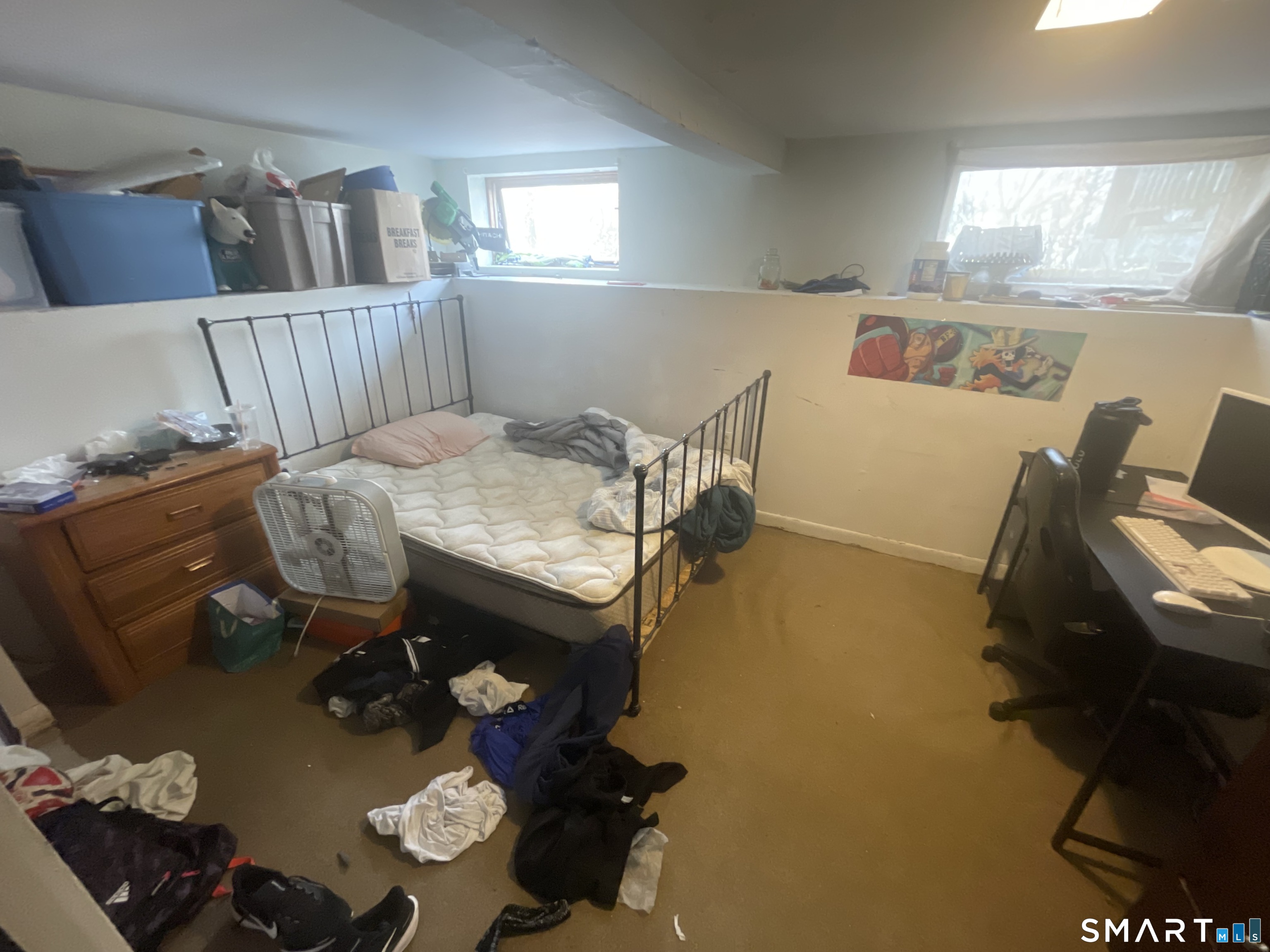 40 Grove Street Ansonia, CT 06401 - Photo 14 of 21 a living room with furniture and a window