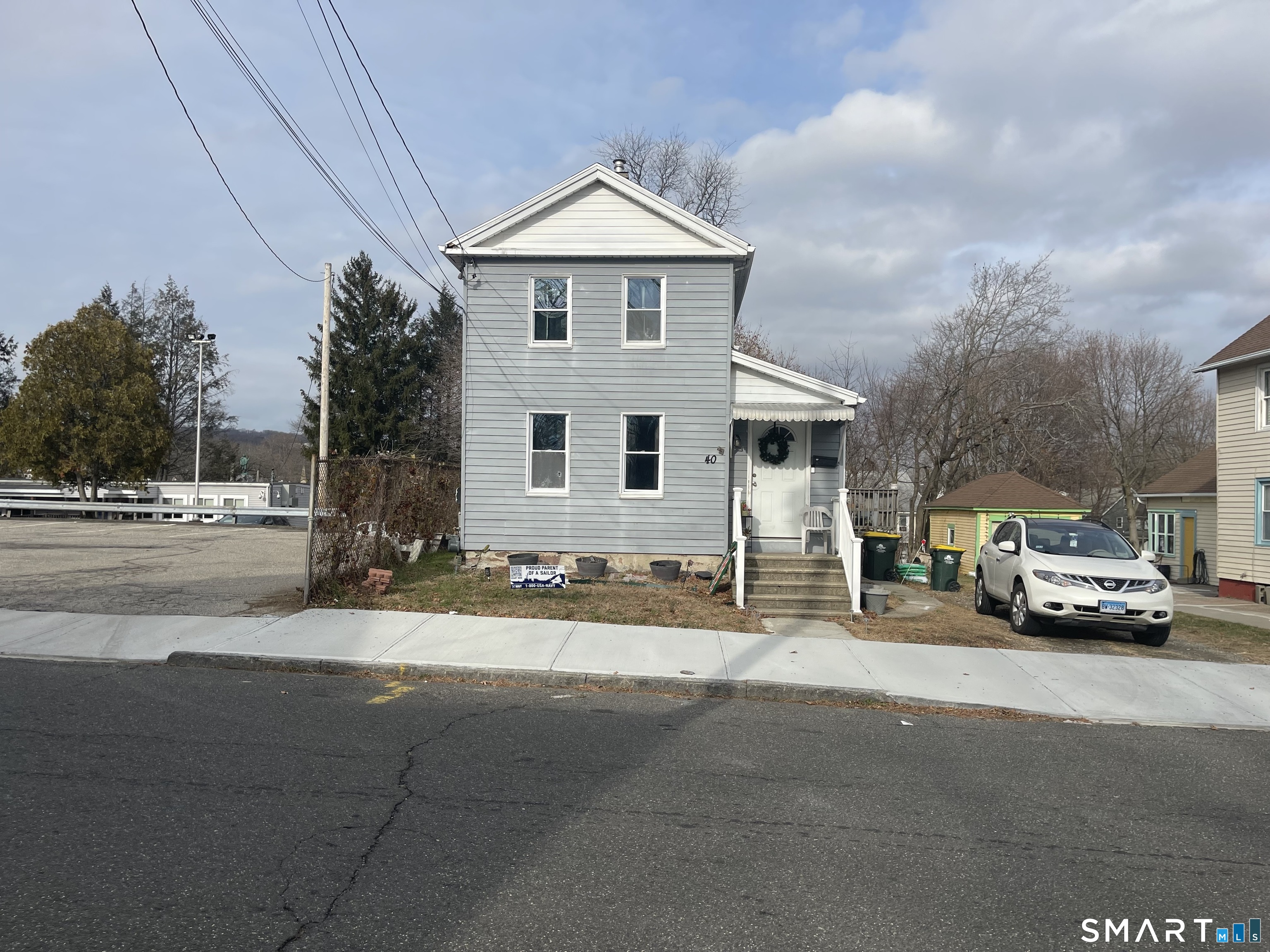 40 Grove Street Ansonia, CT 06401 - Photo 2 of 21 a view of a street that has couple of cars parked on the road
