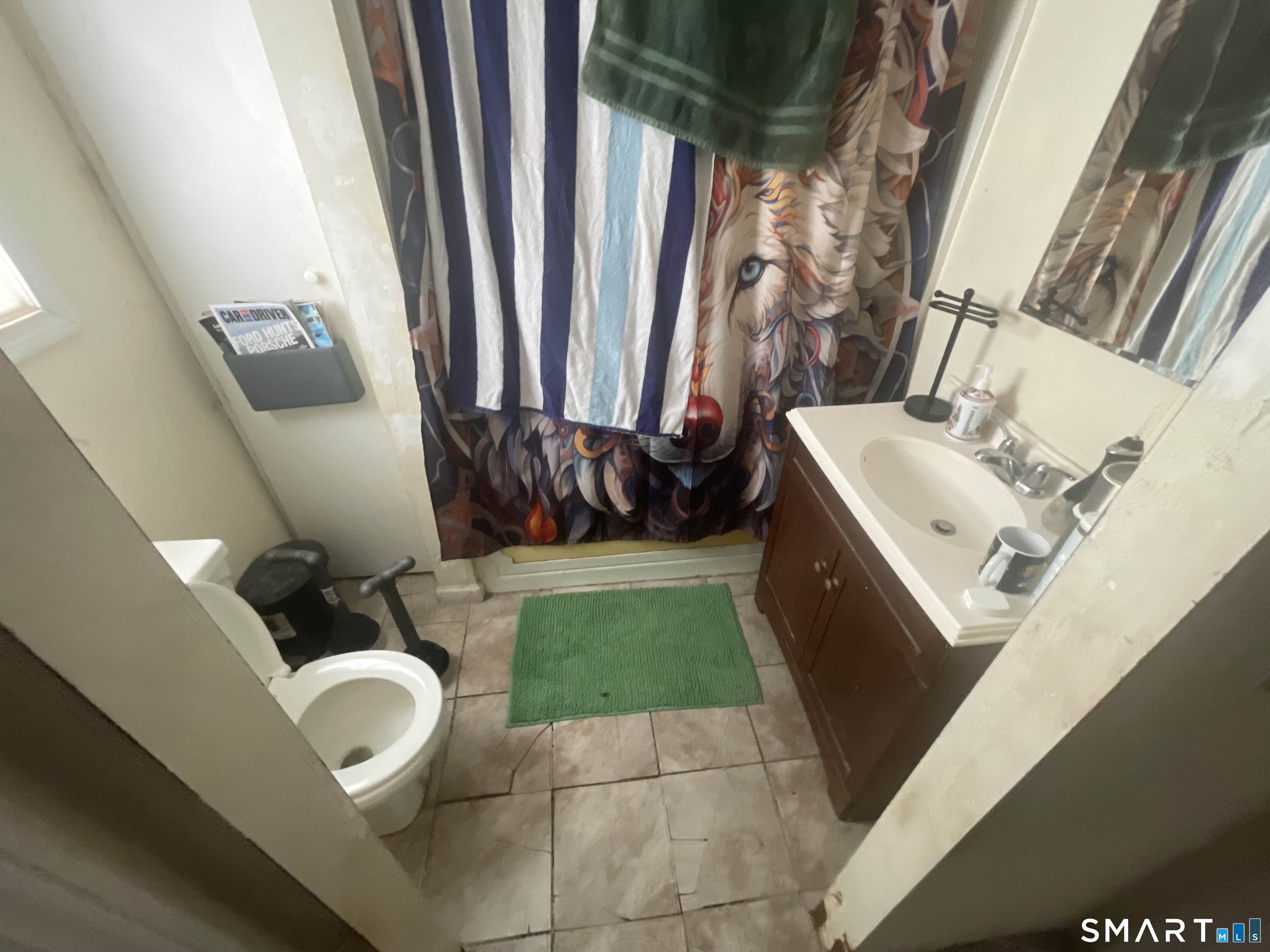 40 Grove Street Ansonia, CT 06401 - Photo 6 of 21 a bathroom with a sink and mirror