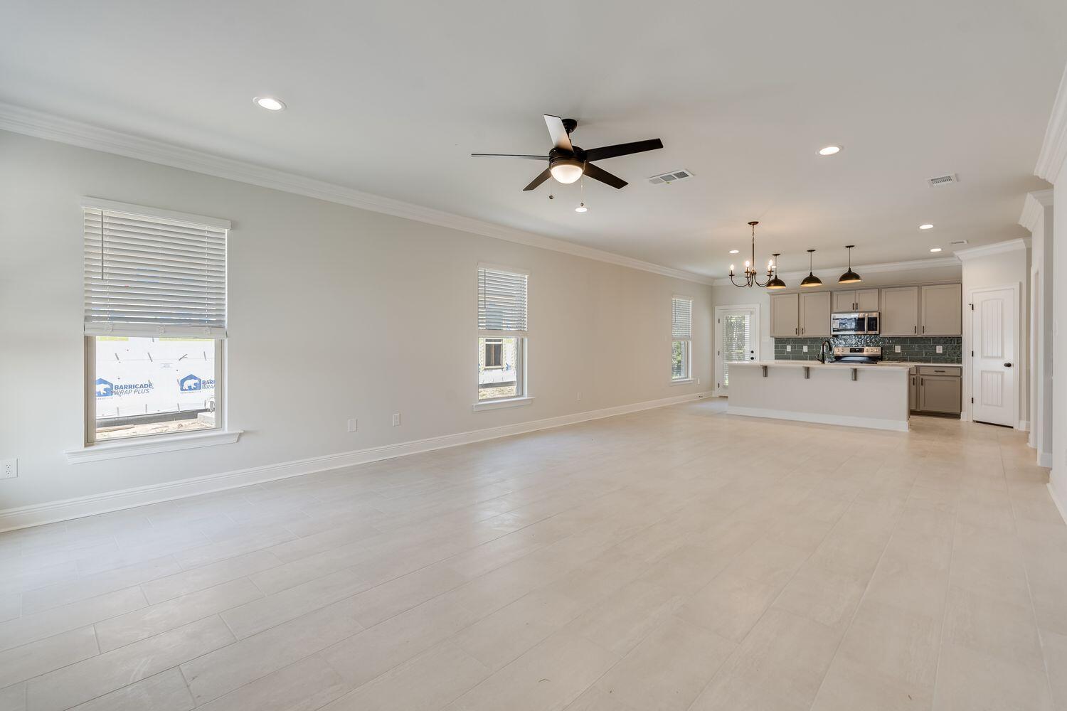 77 Eclipse Loop Freeport, FL 32439 - Photo 6 of 31 a view of a kitchen with a sink and a window