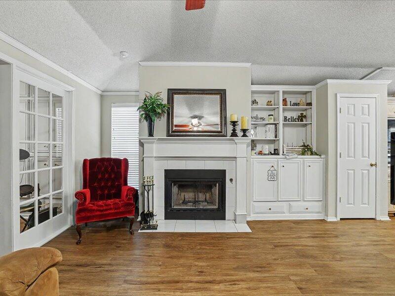 2908 85th Street Lubbock, TX 79423 - Photo 4 of 15 Lovely fireplace and built ins