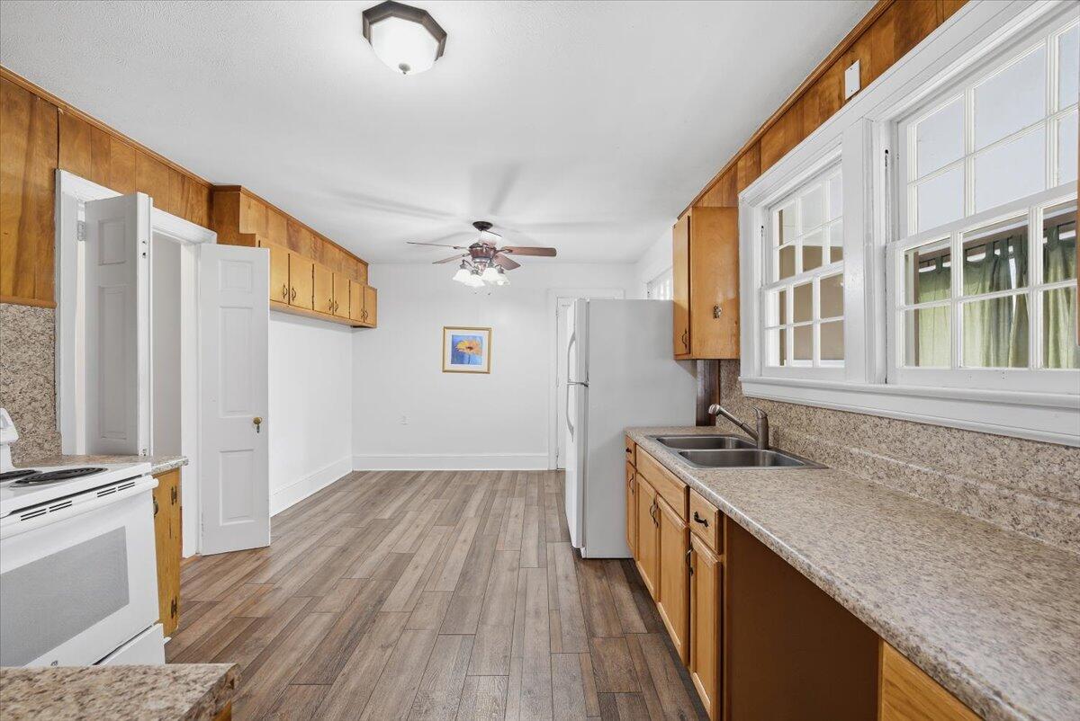 9419 Franklin Street Ferrum, VA 24088 - Photo 14 of 100 a hallway with a sink and dishwasher