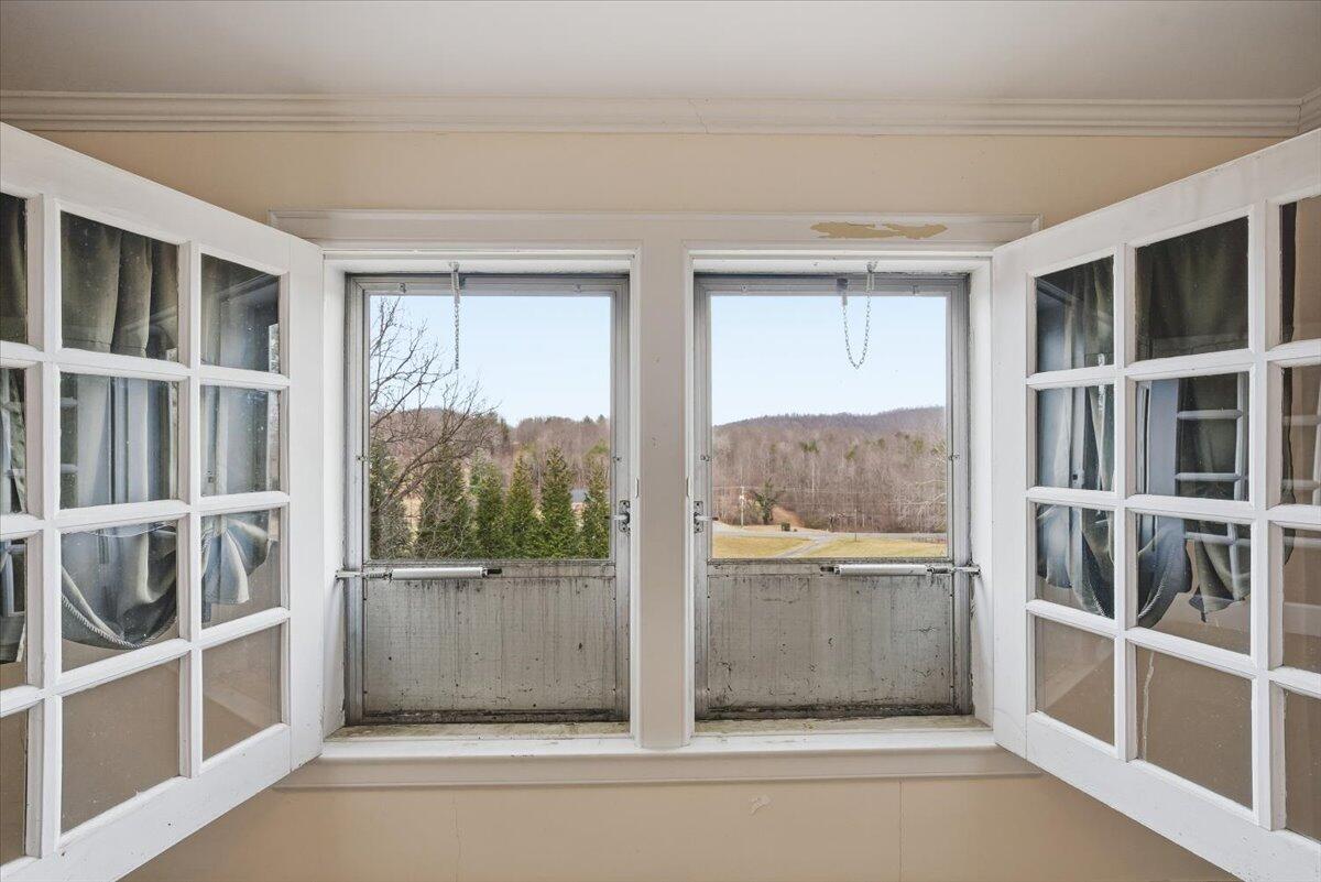 9419 Franklin Street Ferrum, VA 24088 - Photo 36 of 100 a view of a house with a large window and front door