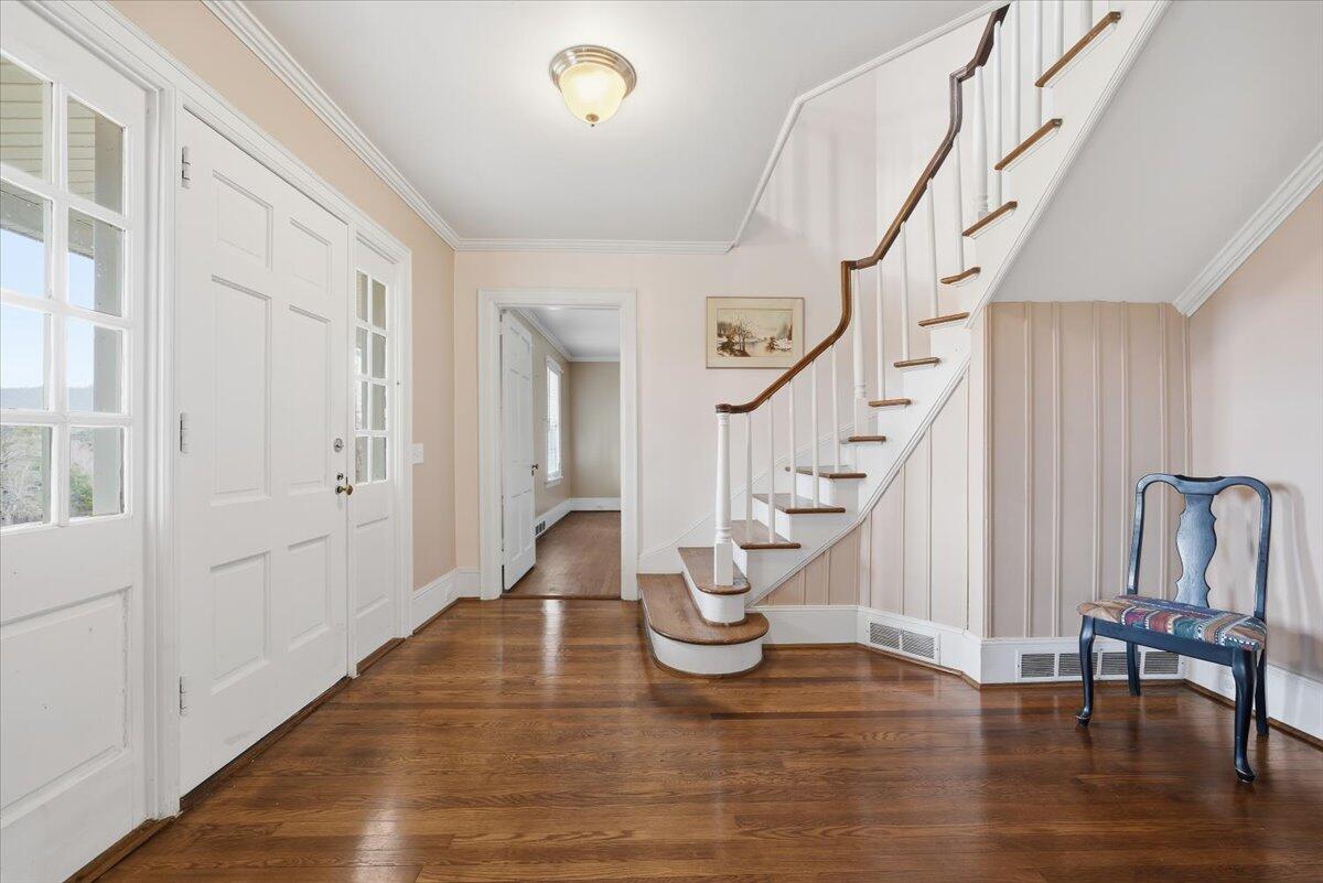 9419 Franklin Street Ferrum, VA 24088 - Photo 4 of 100 a view of entryway with wooden floor and stairs