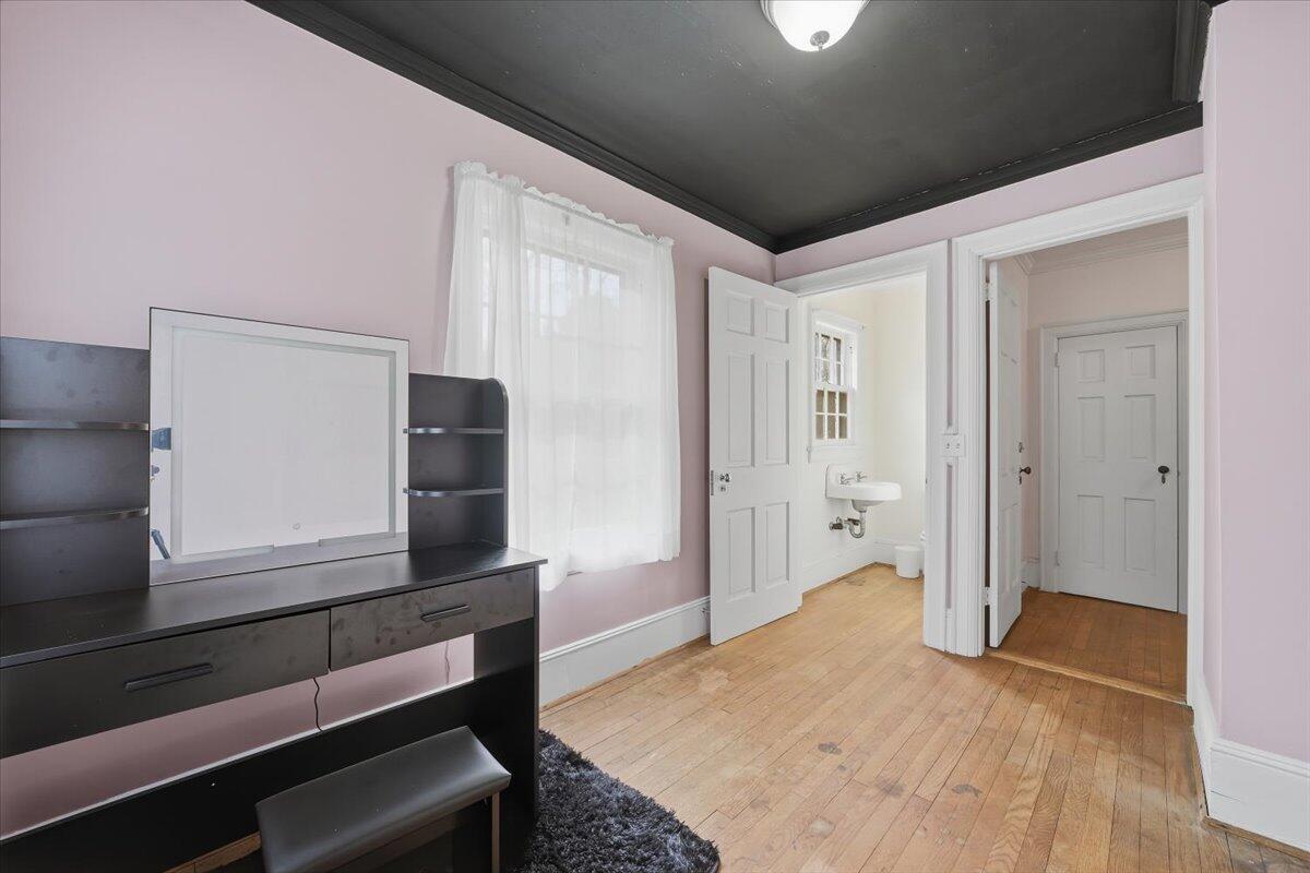 9419 Franklin Street Ferrum, VA 24088 - Photo 46 of 100 a bedroom with a bed and a dresser