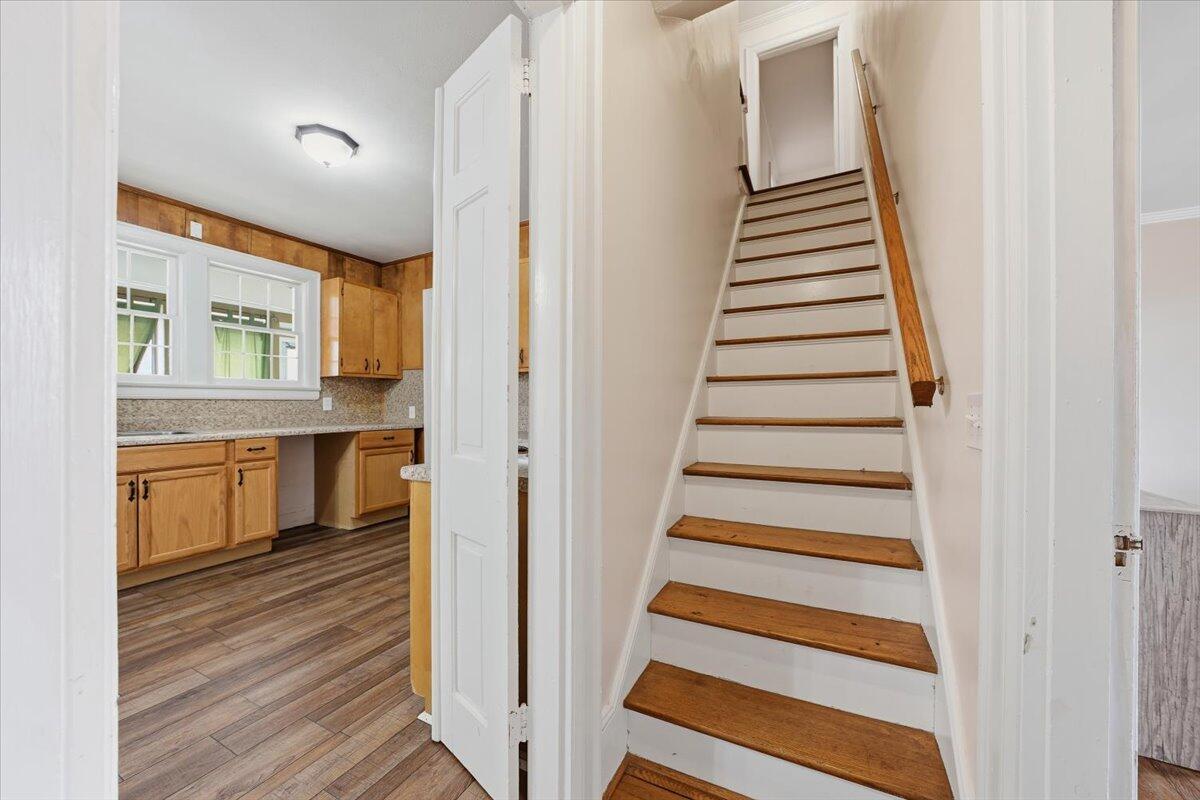 9419 Franklin Street Ferrum, VA 24088 - Photo 48 of 100 a view of a hallway with wooden floor and entryway