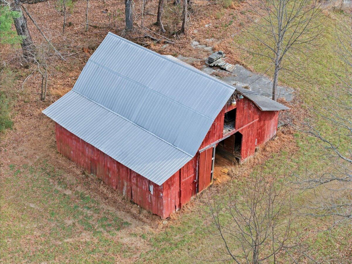 9419 Franklin Street Ferrum, VA 24088 - Photo 68 of 100 a backyard of a house with wooden stairs