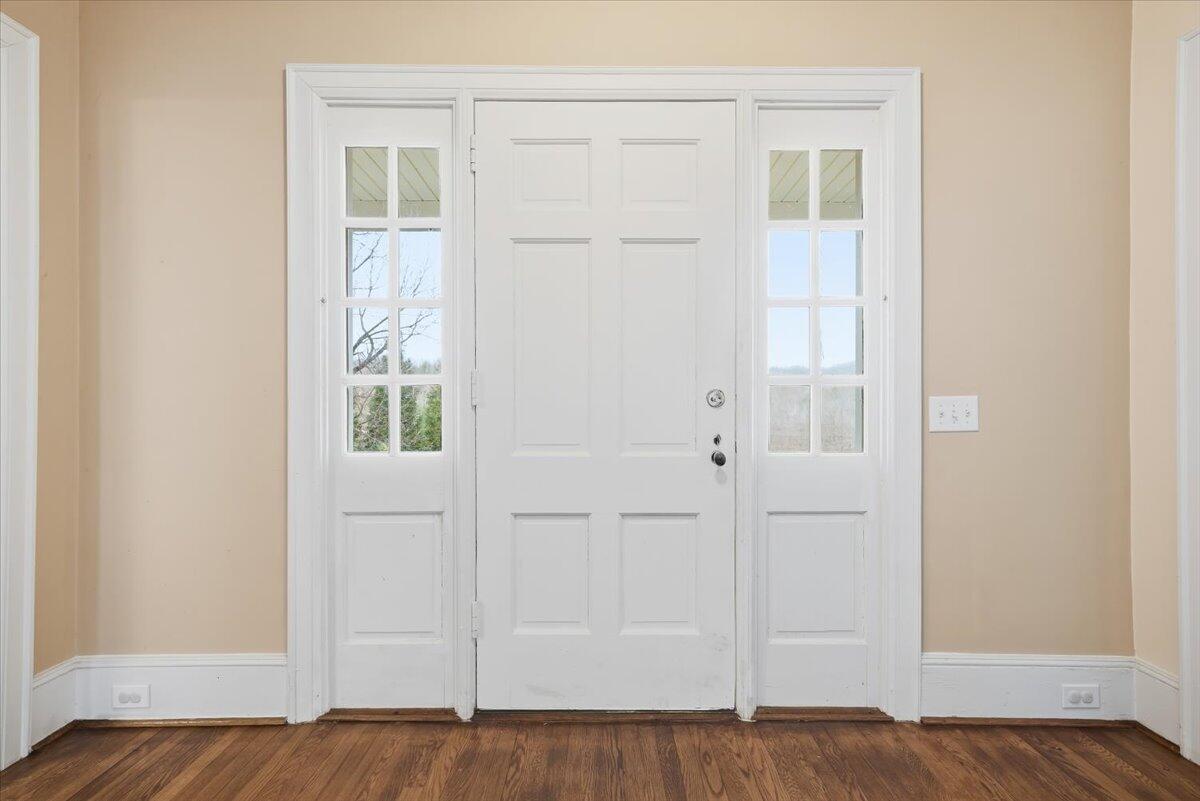 9419 Franklin Street Ferrum, VA 24088 - Photo 9 of 100 an empty room with wooden floor closet and windows