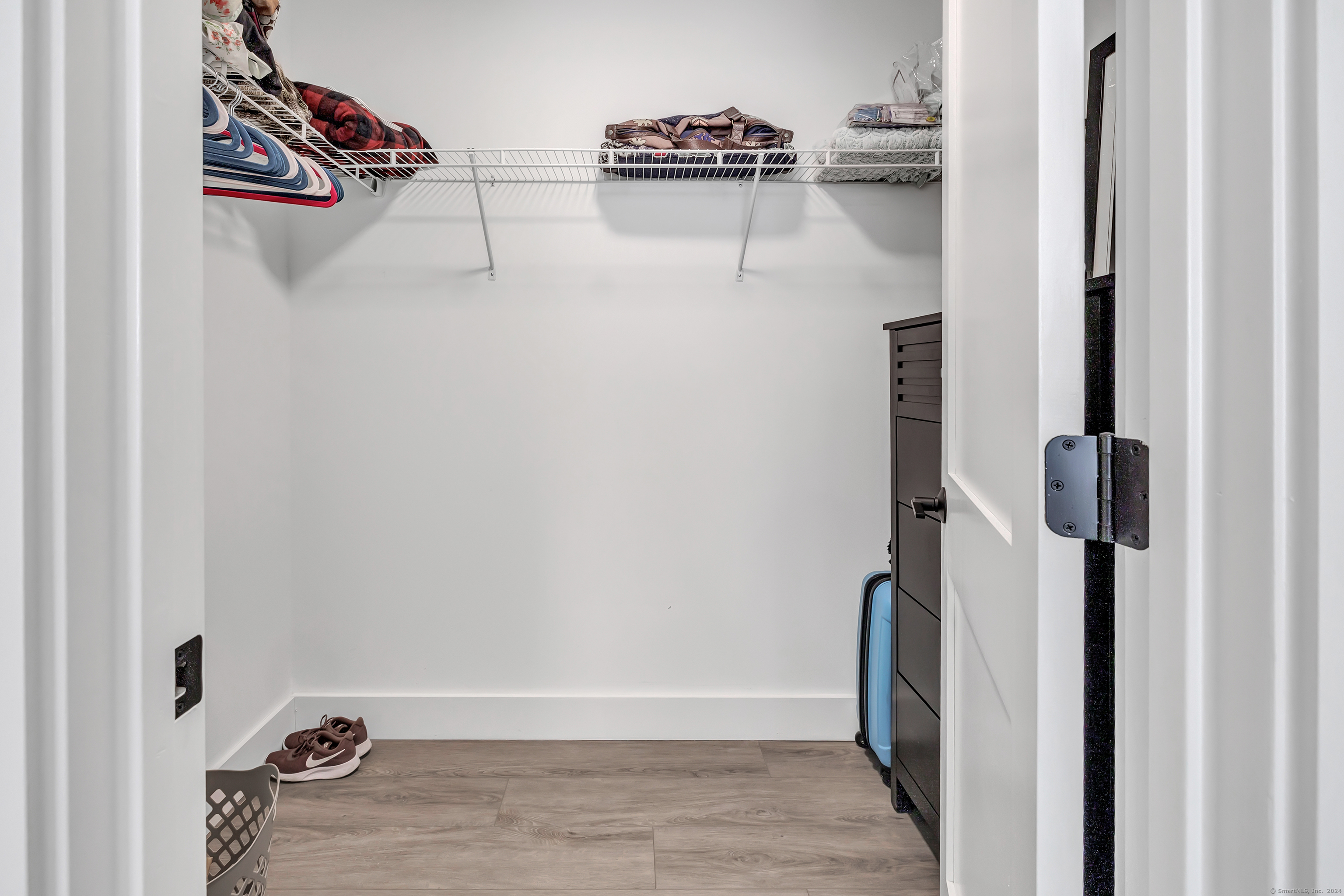 37 Old Rte 7, Unit 3 Brookfield, CT 06804 - Photo 28 of 39 a view of walk in closet with clothes