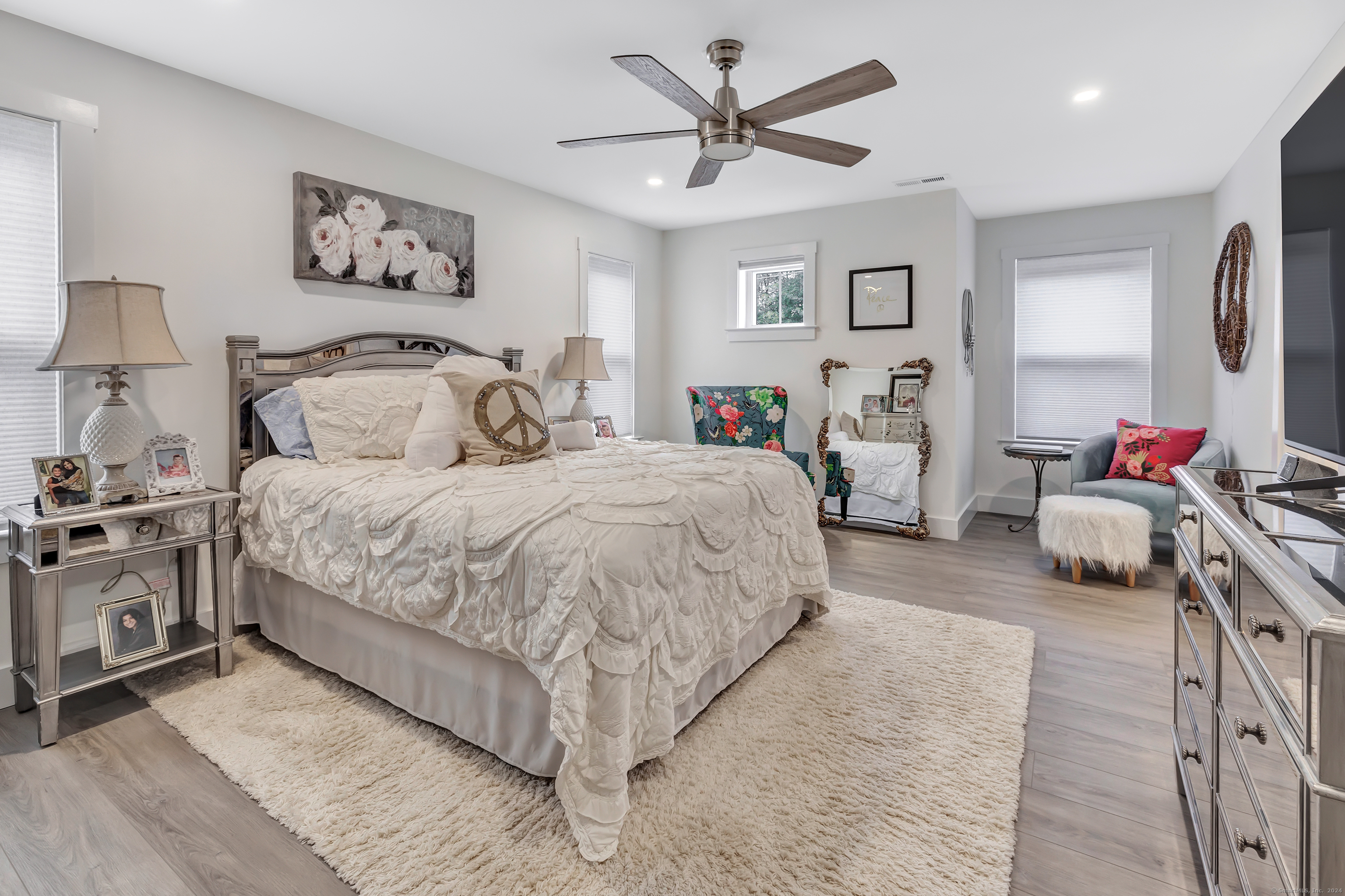 37 Old Rte 7, Unit 3 Brookfield, CT 06804 - Photo 31 of 39 a spacious bedroom with a bed a couch and a window
