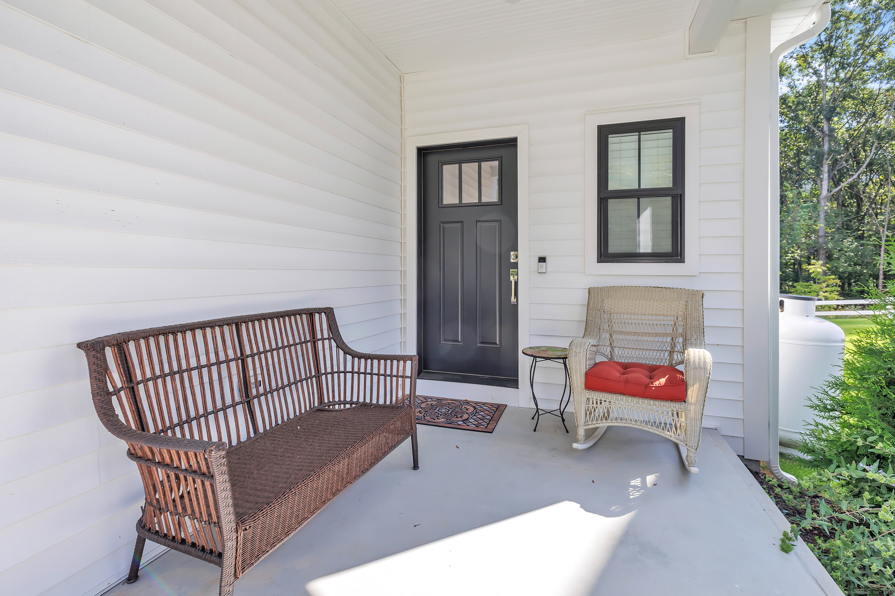 37 Old Rte 7, Unit 3 Brookfield, CT 06804 - Photo 5 of 39 a view of a porch with chairs and stairs