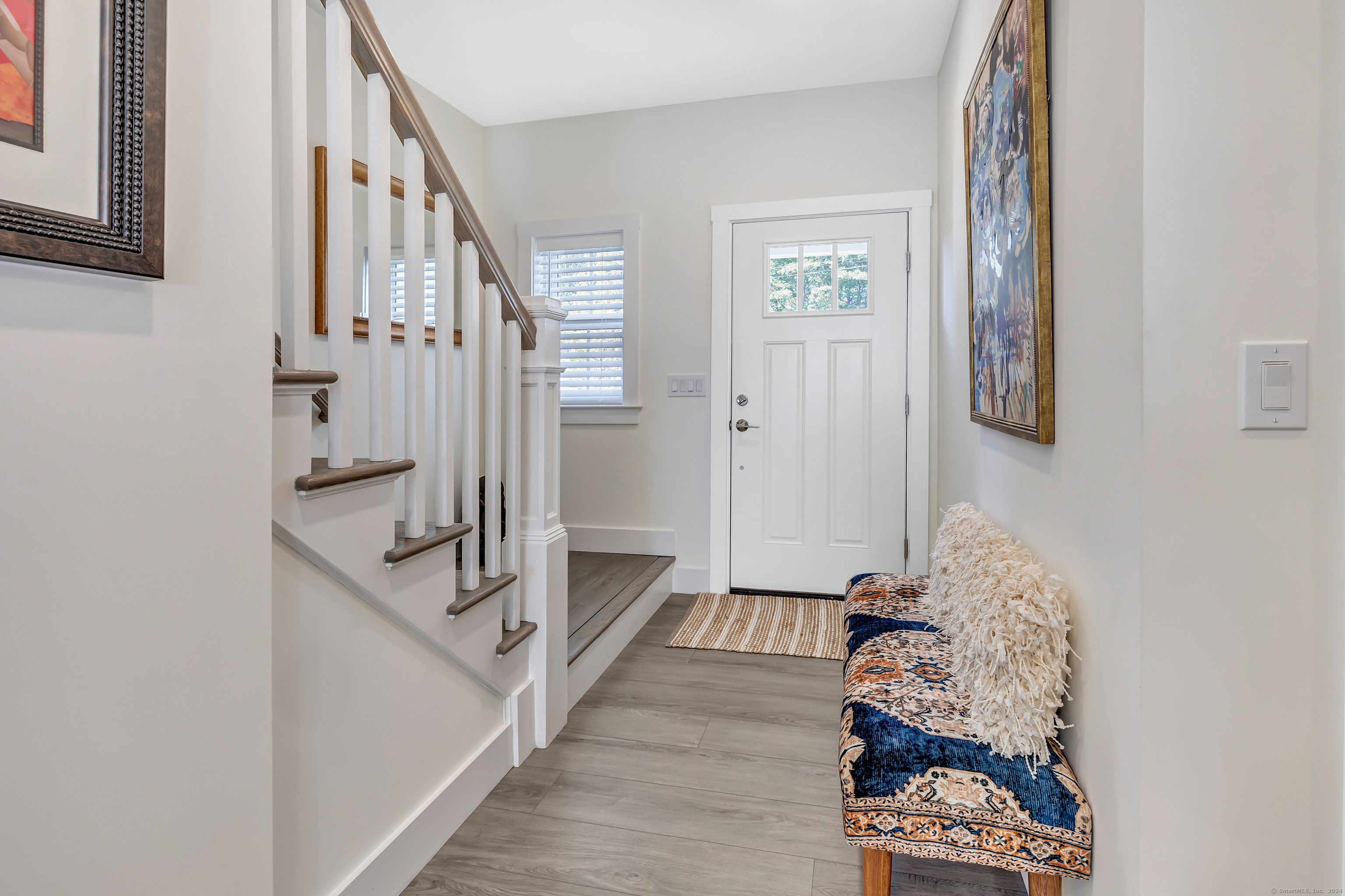 37 Old Rte 7, Unit 3 Brookfield, CT 06804 - Photo 7 of 39 a view of a hallway with windows and stairs