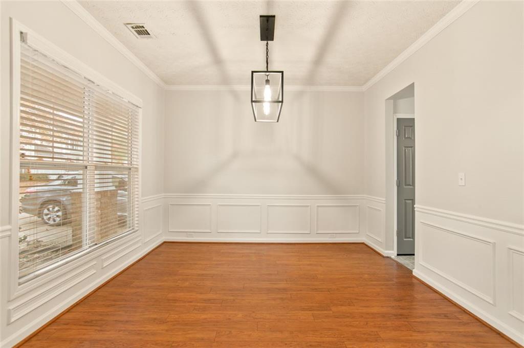 808 Inkberry Road Canton, GA 30114 - Photo 13 of 50 a view of an empty room with a window