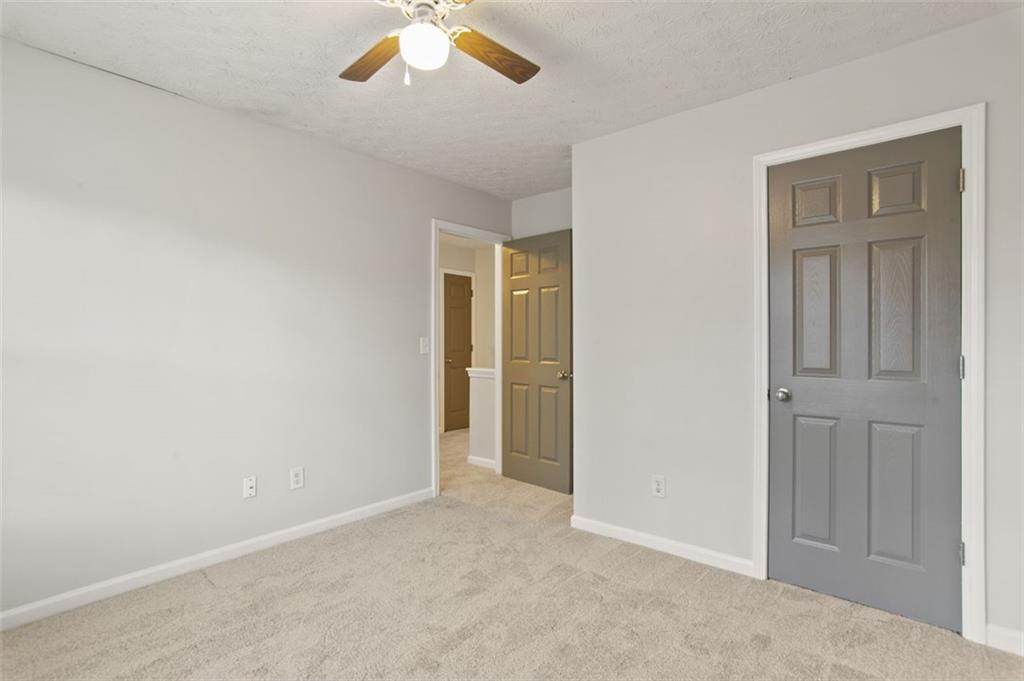 808 Inkberry Road Canton, GA 30114 - Photo 26 of 50 an empty room with closet area