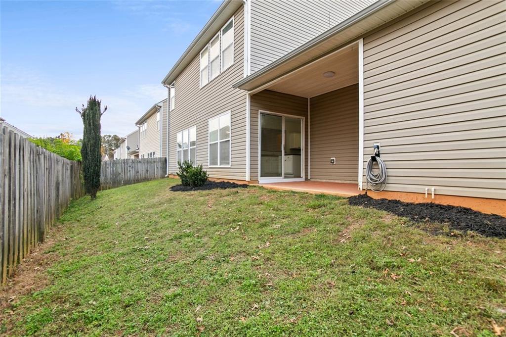 808 Inkberry Road Canton, GA 30114 - Photo 40 of 50 a backyard of a house