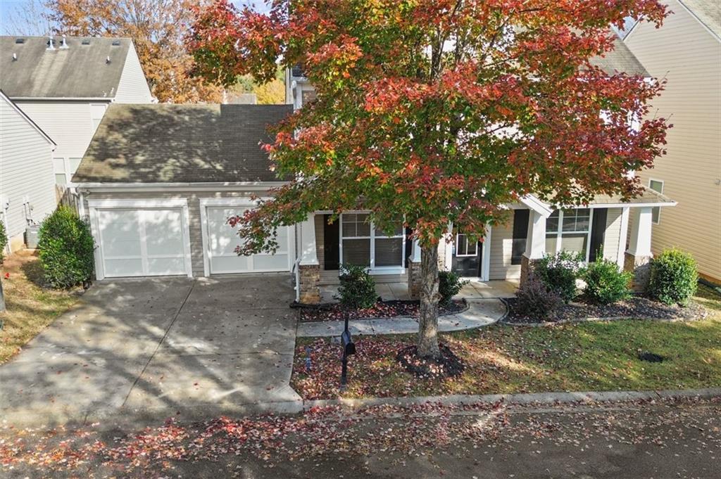 808 Inkberry Road Canton, GA 30114 - Photo 5 of 50 a view of a house with backyard porch and sitting area