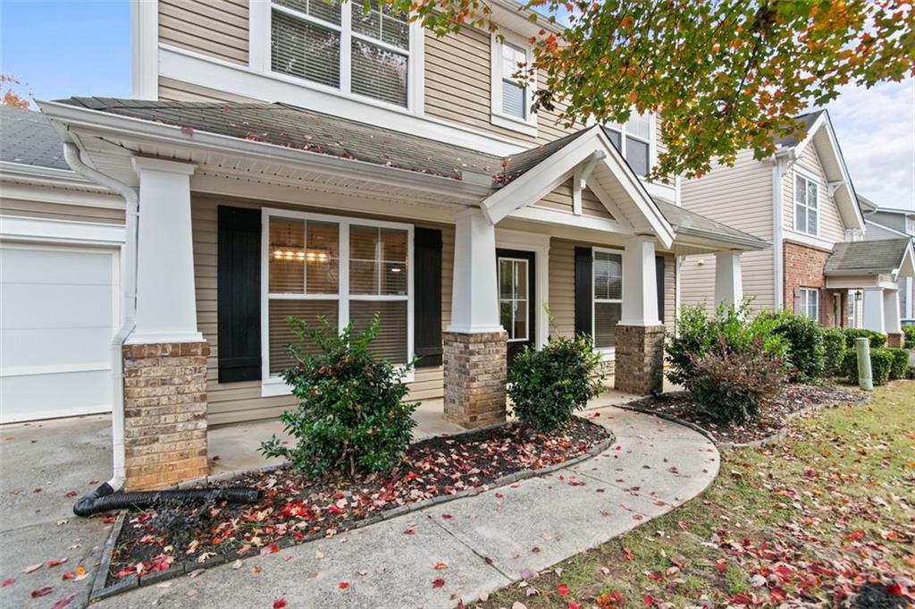 808 Inkberry Road Canton, GA 30114 - Photo 7 of 50 front view of a house with potted plants