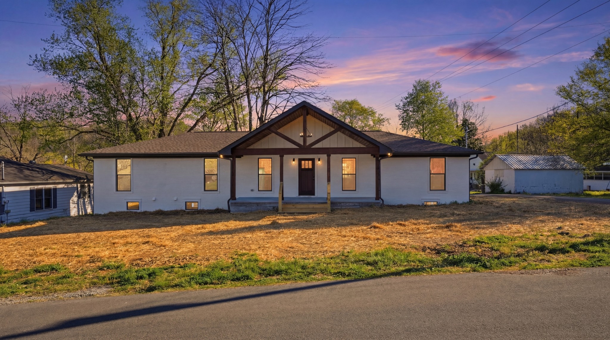 a front view of a house with a yard