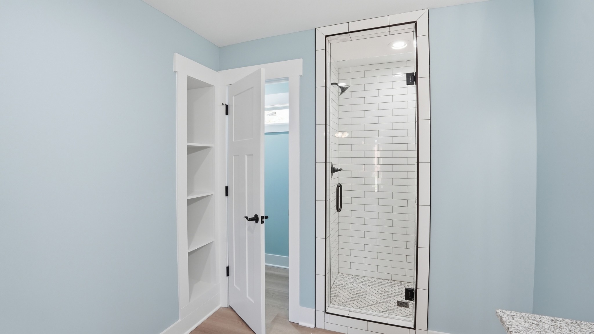 104 Division Street Normandy, TN 37360 - Photo 22 of 48 a bathroom with a glass shower door
