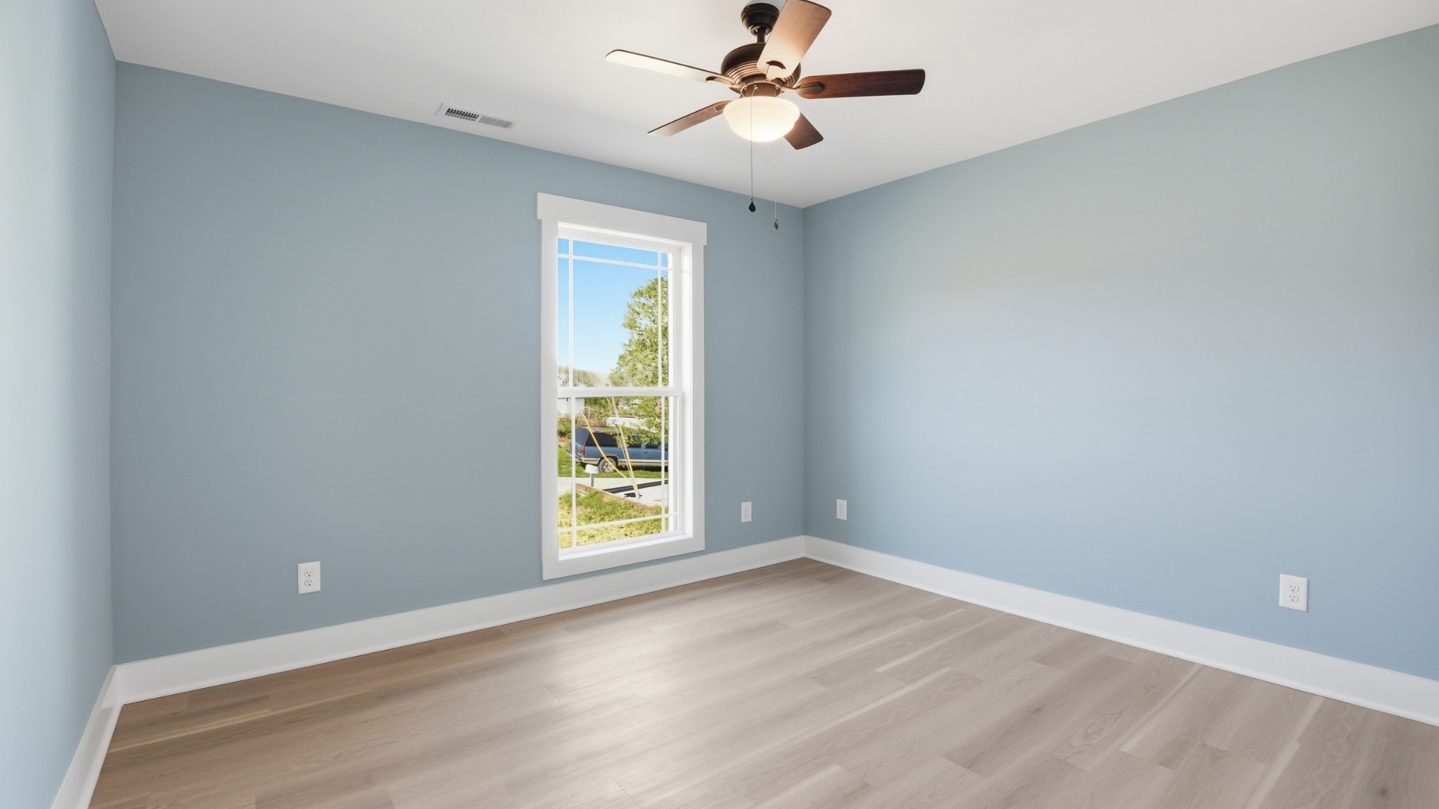 104 Division Street Normandy, TN 37360 - Photo 27 of 48 an empty room with windows and fan