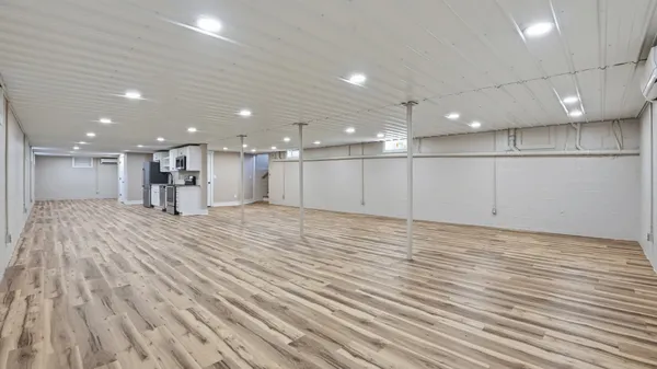 a view of entryway with wooden floor