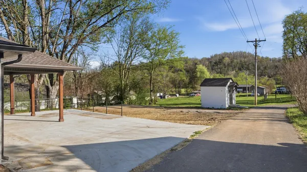 a house with trees in the background