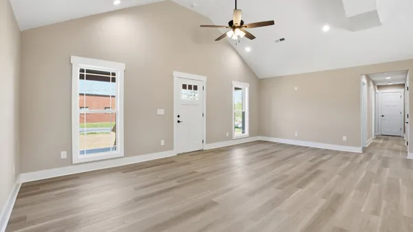 a view of an empty room with a window