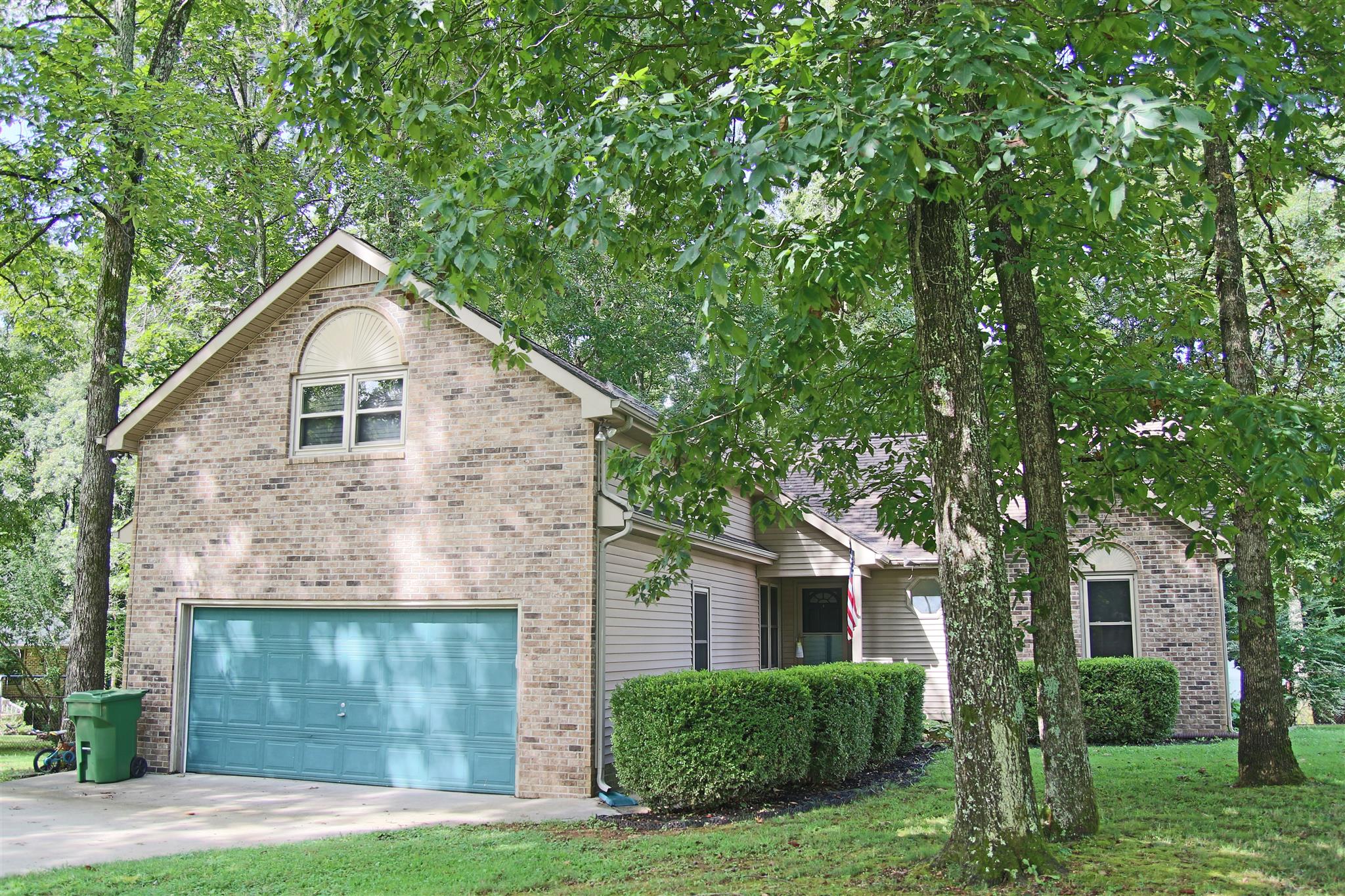 39 Smoke Rise Circle Manchester, TN 37355 - Photo 1 of 29 a front view of a house with garden