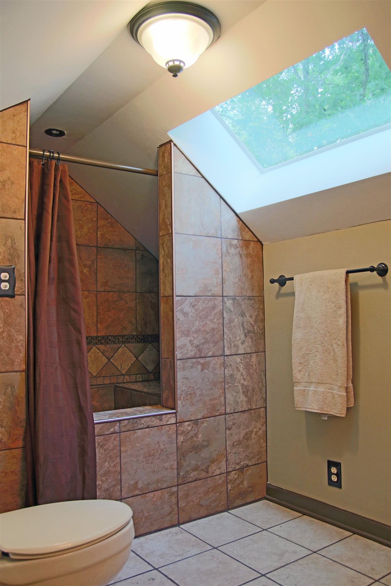 39 Smoke Rise Circle Manchester, TN 37355 - Photo 23 of 29 a bathroom with a toilet and a shower