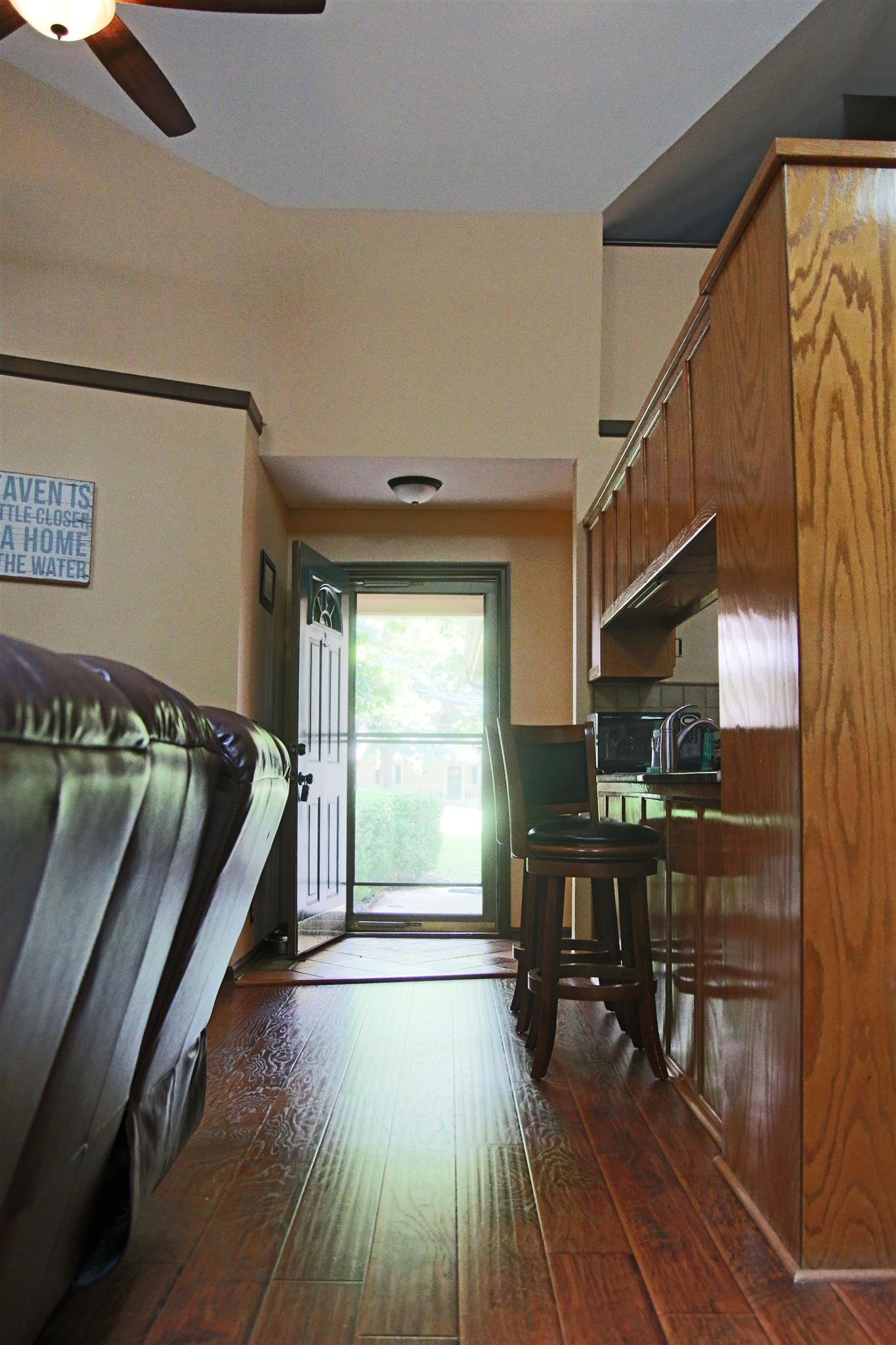 39 Smoke Rise Circle Manchester, TN 37355 - Photo 3 of 29 a view of front door and porch with wooden floor