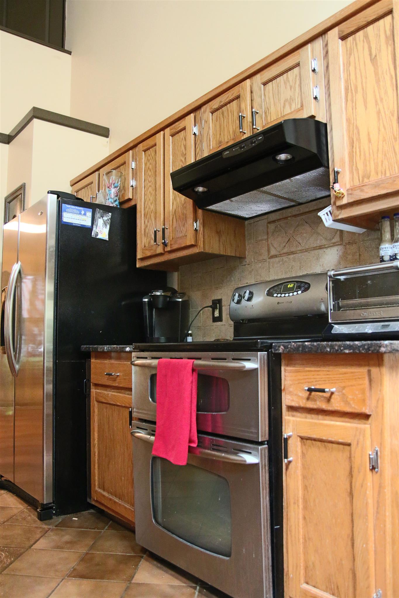 39 Smoke Rise Circle Manchester, TN 37355 - Photo 9 of 29 a kitchen with stainless steel appliances granite countertop a refrigerator and a stove