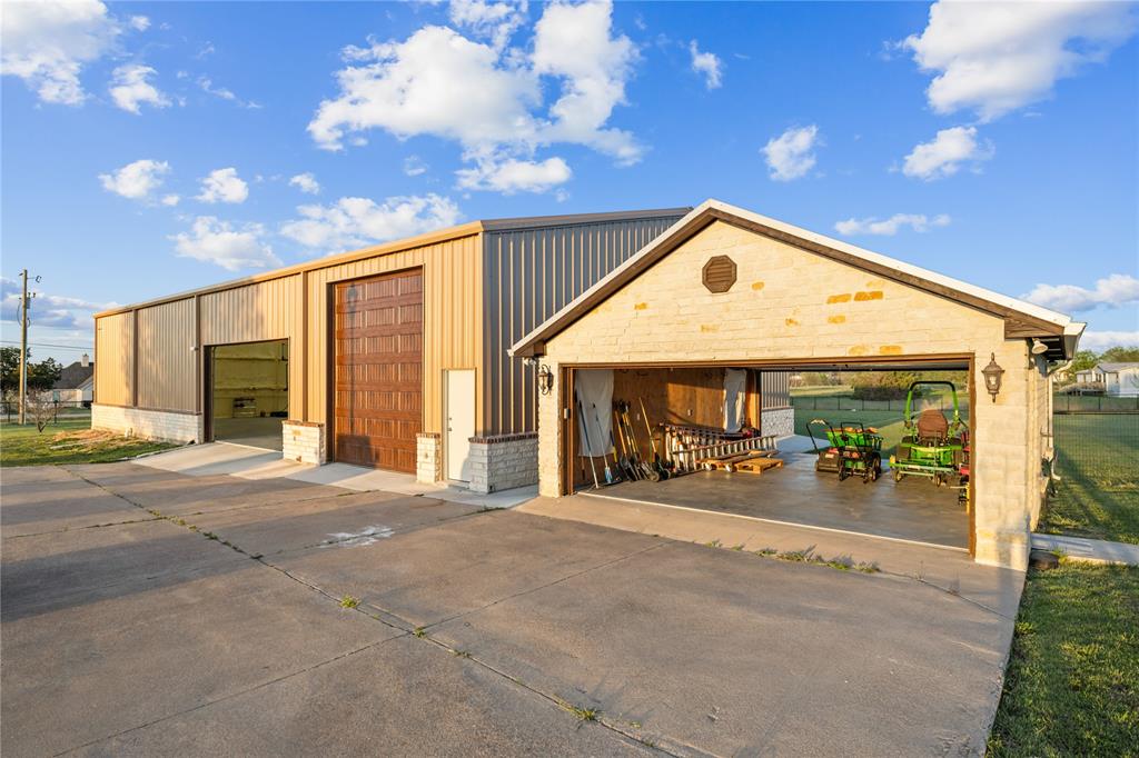 6925 Sky Road Joshua, TX 76058 - Photo 34 of 37 WIth 2 gar garage next to it.