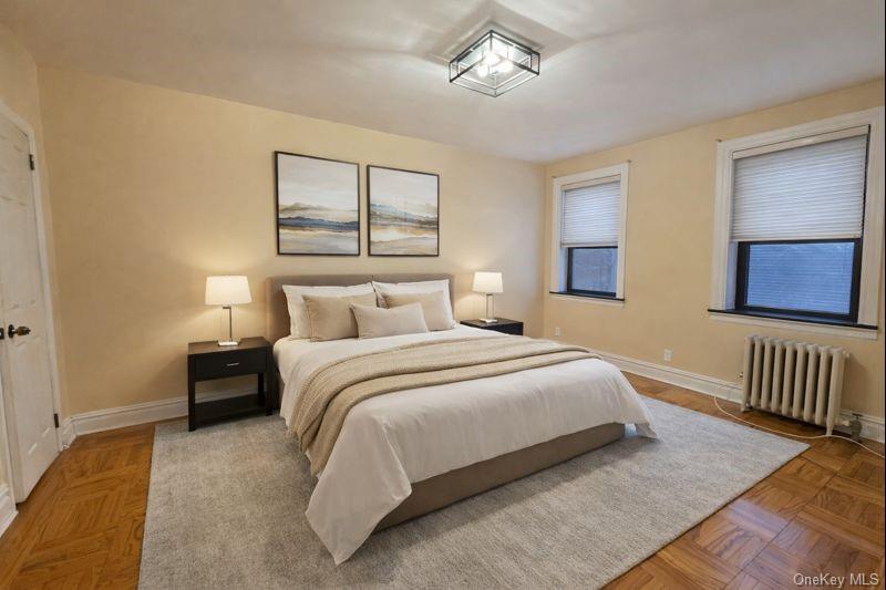42 Barker Avenue, Unit 2B White Plains, NY 10601 - Photo 4 of 13 Bedroom with radiator and baseboards