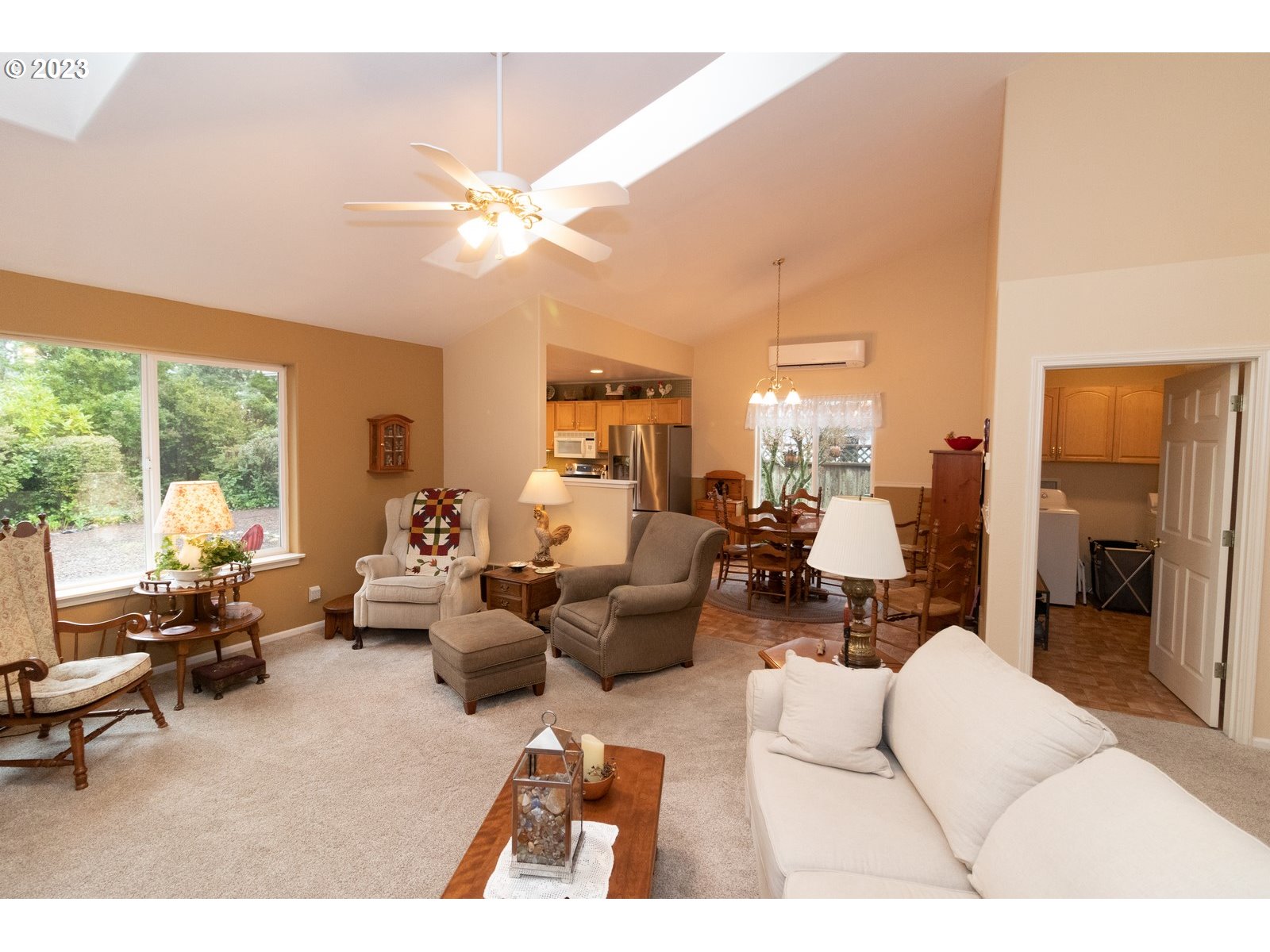 18 Mariners Lane Florence, OR 97439 - Photo 5 of 28 a living room with furniture and a large window