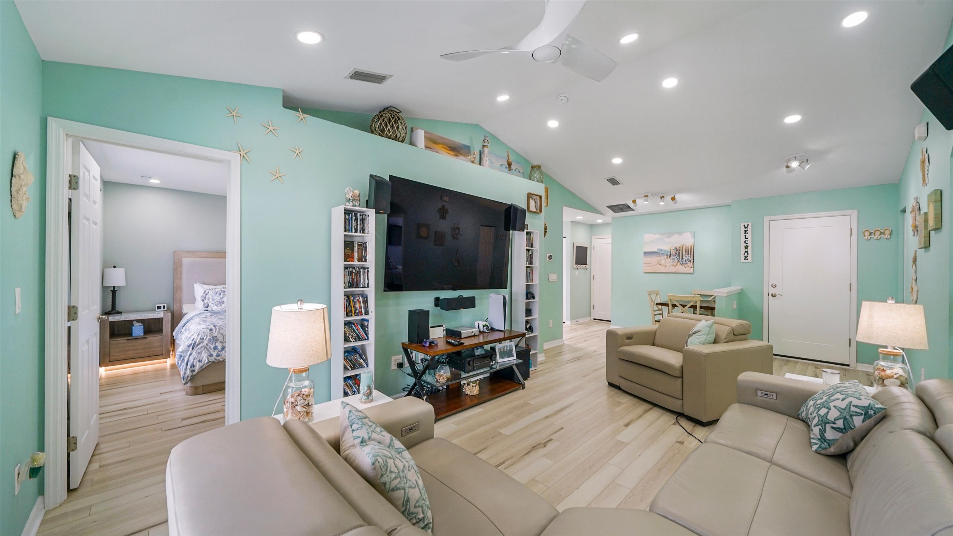 321 West Jayce Way St. Augustine, FL 32084 - Photo 6 of 34 a living room with furniture and a flat screen tv