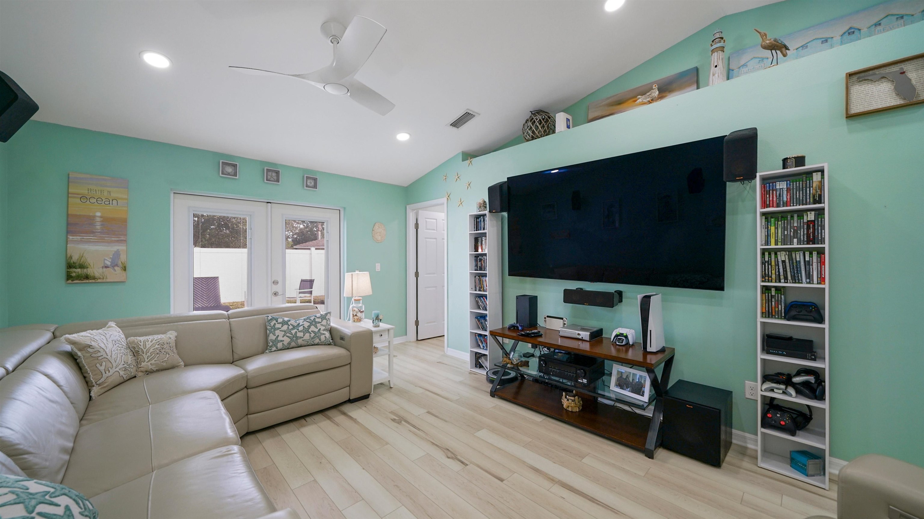 321 West Jayce Way St. Augustine, FL 32084 - Photo 8 of 34 a living room with furniture and a flat screen tv