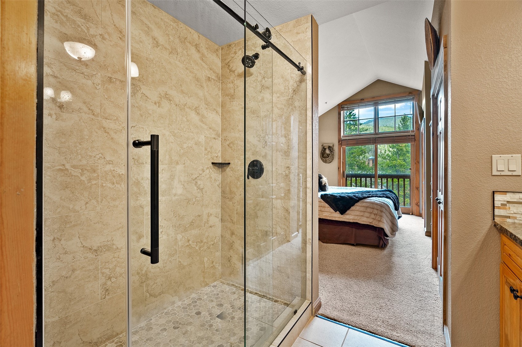 57 Lake Ridge Circle, Unit 1848 Keystone, CO 80435 - Photo 20 of 49 a bathroom with a tub shower and a sink