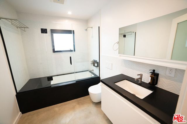 a living room with a couch and furniture