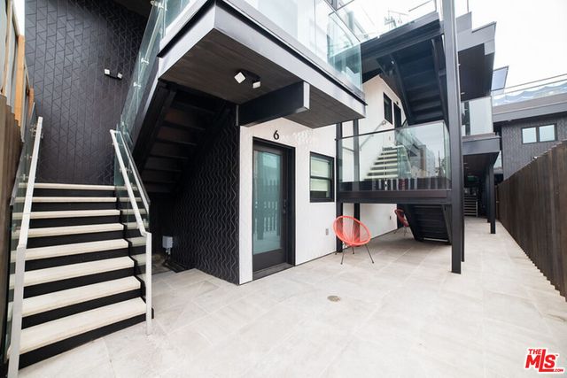 a view of a terrace with seating area