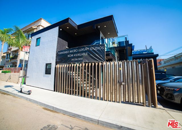 a cars parked in front of a house