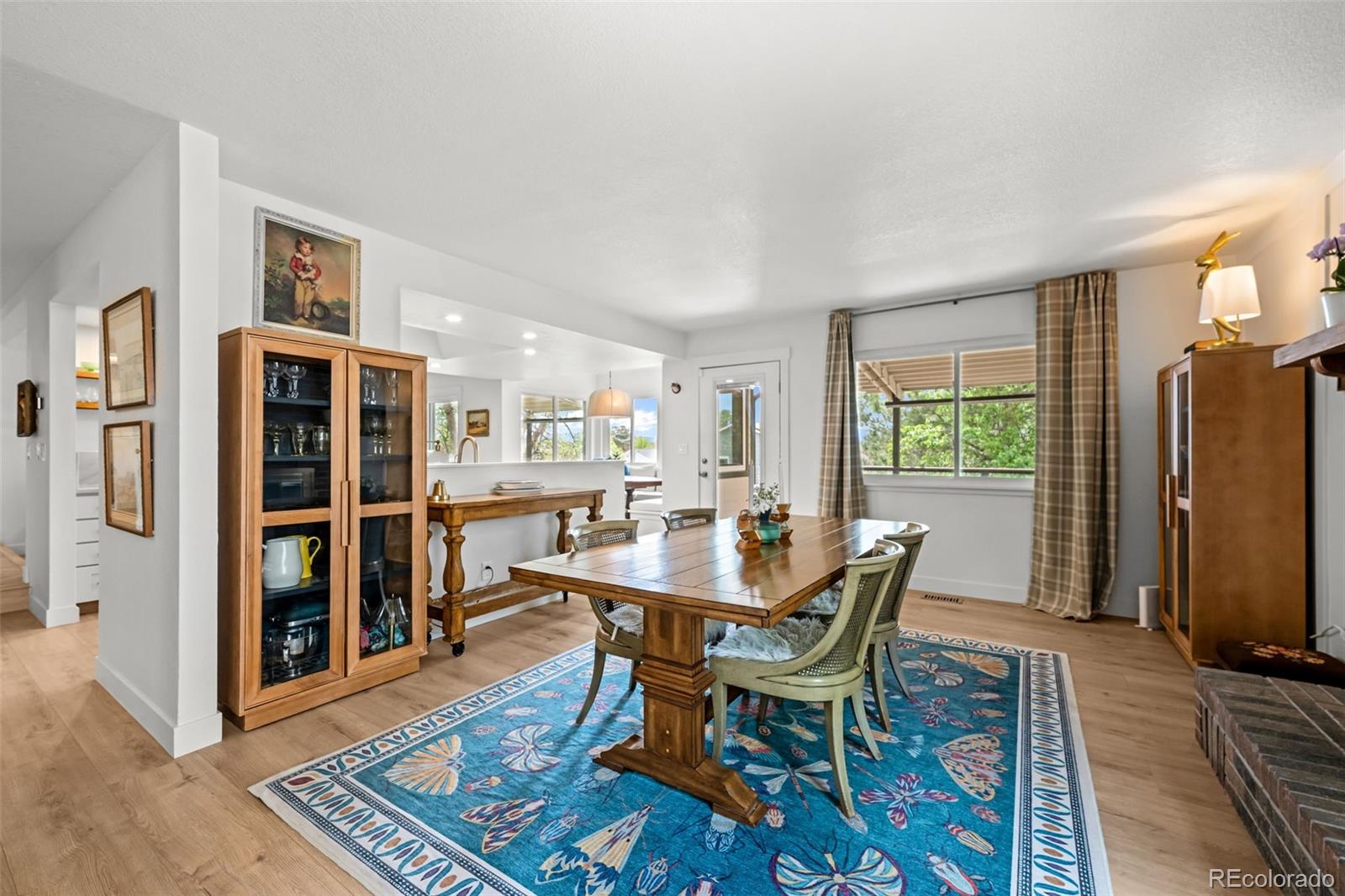 755 Old Stone Drive Highlands Ranch, CO 80126 - Photo 17 of 44 a dining room with furniture and wooden floor